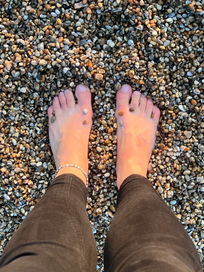 Feet on pebbles